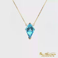 Load and play video in Gallery viewer, 14K Yellow Gold Necklace Kite Shaped Blue Topaz