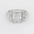 Load and play video in Gallery viewer, Platinum Three Stone Emerald Cut Lab Grown Diamond Ring