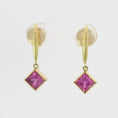 Load and play video in Gallery viewer, 14k Yellow Gold  Pink Sapphire Dangle Earrings