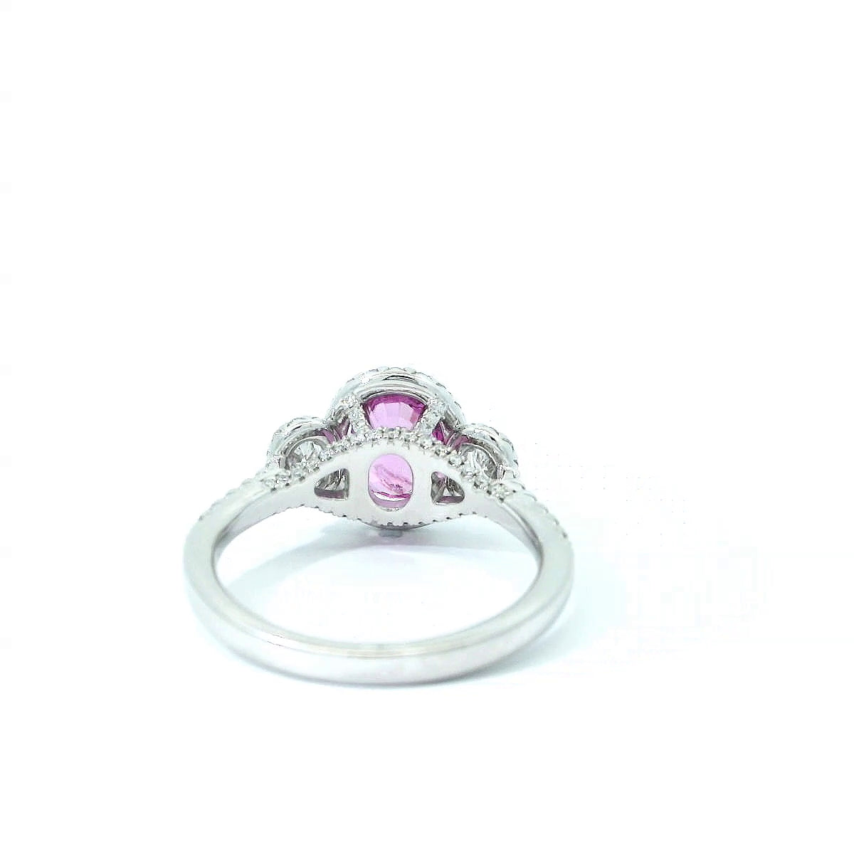 Platinum Pink Sapphire and Diamond 3-Stone Ring with Diamond Halo