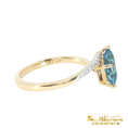 Load image into Gallery viewer, Yellow Gold Princess Ring Featuring a Blue Topaz
