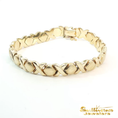Load image into Gallery viewer, 14K Yellow Gold 'X' and 'O' Link Chain Bracelet

