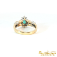 Load image into Gallery viewer, 14K Two Tone Gold Pear-Cut Emerald Halo Ring
