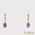 Load and play video in Gallery viewer, 14K Yellow Gold Oval Tanzanite Drop Earrings
