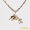 Load and play video in Gallery viewer, 14K Yellow Gold Double Dolphin Pendant

