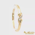 Load and play video in Gallery viewer, 14K Two-Tone Gold Hinged Diamond Bangle
