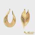 Load and play video in Gallery viewer, 14K Yellow Gold Tube Twist Hoop Earrings
