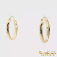 Load and play video in Gallery viewer, 14K Yellow Gold Classic Oval Hoop Earrings
