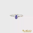 Load and play video in Gallery viewer, 14K White Gold Tanzanite Infinity Ring
