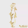 Load and play video in Gallery viewer, 14K Yellow Gold Dolphin Bracelet
