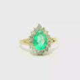 Load and play video in Gallery viewer, 14K Yellow Gold Pear Emerald Diamond Halo Ring
