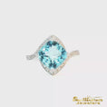 Load and play video in Gallery viewer, 18K White Gold Bypass Aquamarine Ring
