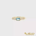 Load and play video in Gallery viewer, 14K Yellow Gold Emerald Cut Blue Topaz and Diamond Ring
