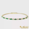 Load and play video in Gallery viewer, 14K Yellow Gold Emerald Flex Bangle
